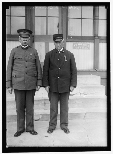 DRISCOLL, JOHN. VETERAN OF FIGHT BETWEEN MERRIMAC AND MONITOR. RIGHT, WITH GENERAL SMITH, ANOTHER VETERAN OF THE FIGHT