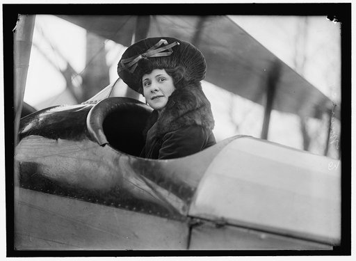 MUNSEY, EDNA. IN PLANE