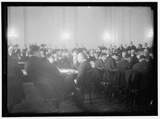 HOUSE OF REPRESENTATIVES COMMITTEES. COMMITTEE TO INVESTIGATE THE ALLEGED DIVULGENCE OF PRESIDENT'S NOTE TO BELIGERENT POWERS, POPULARLY CALLED 'LEAK HEARINGS.' TUMULTY, CENTER, TESTIFYING; FOSTER OF OHIO, LEFT, FACING CAMERA