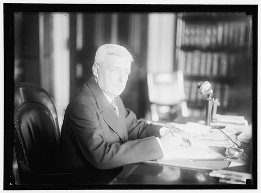 LANSING, ROBERT. SECRETARY OF STATE, 1915-1920. AT DESK