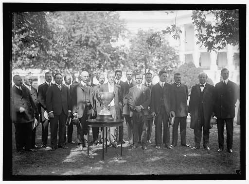EASTERN YACHT CLUB. PRESIDENT WILSON PRESENTING CLUB CUP TO OWNER OF YACHT 'ELLEN' WHO WON RACE OFF MARBLEHEAD, MASS.