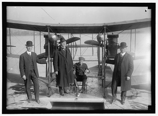 RICHARDSON TANDEM BIPLANE HYDROPLANE ON POTOMAC, APRIL, 1916. GEORGE A. GRAY AT CONTROLS. AT LEFT AND RIGHT ARE RICHARDSON BROTHERS WHO BUILT THE PLANE; 2ND FROM LEFT IS THEIR UNCLE, WHOSE IDEA IT WAS