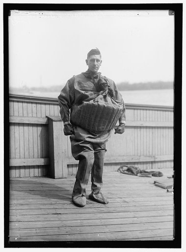 LIFE SAVING SUITS WORN BY T. AUD
