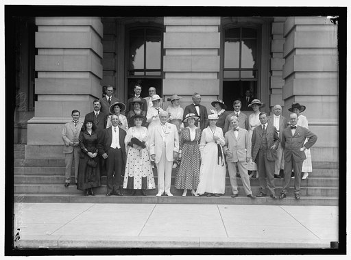 CAPITOL, GROUP AT. FRONT: WOMAN; DEWALT OF PA; WOMAN; CHAMP CLARK; MRS. MARSHALL; MRS. CLARK; VICE PRESIDENT MARSHALL; UNIDENTIFIED; GALLIVAN OF MASS. 2ND ROW: HARDWICK OF GEORGIA; LINTHICUM OF MARYLAND; 4 WOMEN; RAMSEYER OF IOWA; WOMAN; PHELAN OF MASS.; WOMAN; EDMONDS