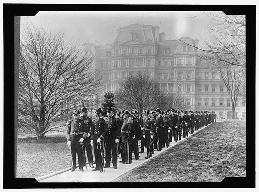 NEW YEAR'S RECEPTION AT WHITE HOUSE. ADMIRAL DEWEY, LEFT FRONT, AND OFFICERS STARTING FOR WHITE HOUSE. ADMIRAL BOB EVANS IS 3RD FROM FRONT, RIGHT