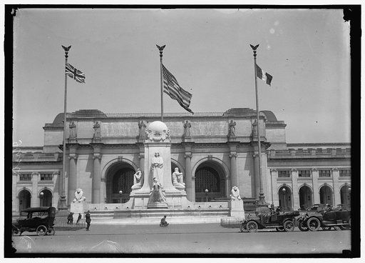 FLAGS. AMERICAN, BRITISH, AND FRENCH FLAGS IN FRONT OF UNION STATION, AWAITING ARRIVAL OF BALFOUR AND ALLIED COMMISSION