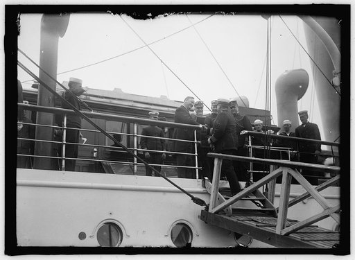 ALLIED COMMISSION TO U.S. BOARDING MAYFLOWER FOR TRIP TO MOUNT VERNON: DANIELS ON BOARD RECEIVING THE COMMISSION