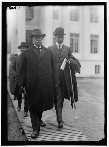 RED CROSS, AMERICAN. WILLIAM H. TAFT AND CHARLES D. NORTON LEAVING RED CROSS BUILDING