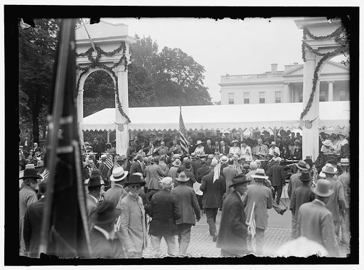 CONFEDERATE REUNION. PRESIDENT AND MRS. WILSON; MARSHALL, ETC. REVIEWING PARADE FROM STAND AT WHITE HOUSE