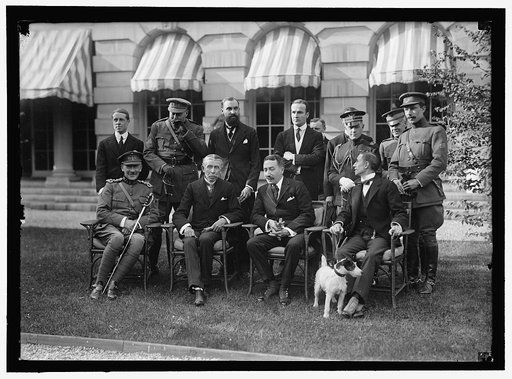 BELGIAN MISSION TO U.S. AT HOME OF LARS [i.e. LARZ] ANDERSON. SEATED: MAJ. GEN. MATHIEW LeCLERCQ; BARON MONCHEUR; EDE CARTIER DeMARCHIENNE, MISSION TO U.S.; HUGH GIBSON OF STATE DEPARTMENT. STANDING: M. DeMERTENS, ONE OF SECRETARIES OF MISSION; MAJ. OSTERRIETH; HECTOR CARLIER; A SECRETARY OF THE MIS