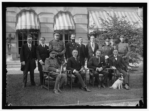 BELGIAN MISSION TO U.S. AT HOME OF LARS [i.e. LARZ] ANDERSON. SEATED: MAJ. GEN. MATHIEW LeCLERCQ; BARON MONCHEUR; EDE CARTIER DeMARCHIENNE, MISSION TO U.S. HUGH GIBSON OF STATE DEPARTMENT. STANDING: M. DeMERTENS, ONE OF SECRETARIES OF MISSION; MAJ. OSTERRIETH; HECTOR CARLIER; A SECRETARY OF THE MISS