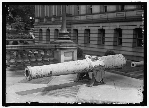 MEDALS, DECORATIONS, ETC. SPANISH GUN AT WAR DEPARTMENT MADE INTO MEDALS