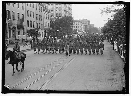 AMERICAN UNIVERSITY TRAINING CAMP. UNIT FROM TRAINING CAMP MARCHING THROUGH CITY