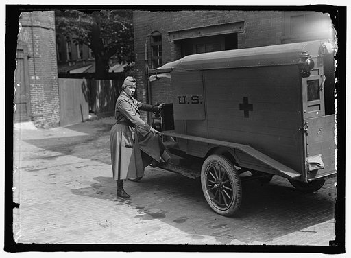 HARRIMAN, MRS. JAMES BORDEN. WITH RED CROSS AMBULANCE