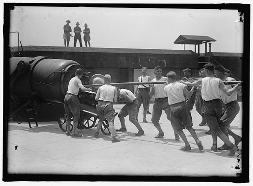 MILITARY TRAINING. LOADING BIG GUN