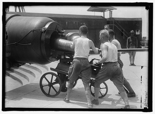MILITARY TRAINING. LOADING BIG GUN