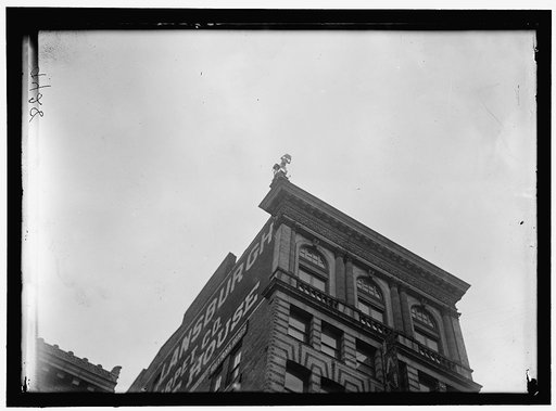 REYNOLDS, J., PERFORMING ACROBATIC AND BALANCING ACTS ON HIGH CORNICE ABOVE 9TH STREET, N.W.