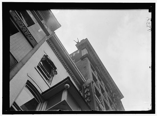 REYNOLDS, J., PERFORMING ACROBATIC AND BALANCING ACTS ON HIGH CORNICE ABOVE 9TH STREET, N.W.