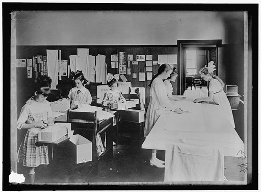RED CROSS GARMENT DIVISION. MISC. VIEWS OF WORK ROOMS AND WOMEN SEWING, KNITTING, ETC.