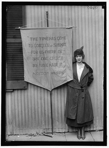 FLOYD, PAULINE, WITH BANNER