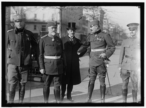 SERBIAN MISSION TO THE U.S. ATL. LT. COL. MICHAILO MENADOVITCH; DR. SIMA LOZANITCH, FORMER MINISTER TO LONDON; FRONT, DR. MILENKO VESVITCH, HEAD OF THE MISSION; FRONT, GEN. MICHAILO RACHITCH; MR. L. MICHAILOVITCH, SERBIAN MIN. TO U.S. REAR: LEFT, VLADISLAV MARTINATZ; CAPT. MILAN YORITEHITCH. OTHERS 