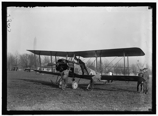 ALLIED AIRCRAFT. DEMONSTRATION AT POLO GROUNDS. COL. CHARLES E. LEE, BRITISH AVIATOR, WITH AVRO TRAINING PLANE DESIGNED BY A.V. ROE OF ENGLAND
