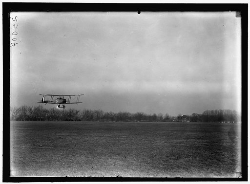 ALLIED AIRCRAFT. DEMONSTRATION AT POLO GROUNDS. COL. CHARLES E. LEE, BRITISH AVIATOR, WITH AVRO TRAINING PLANE DESIGNED BY A.V. ROE OF ENGLAND