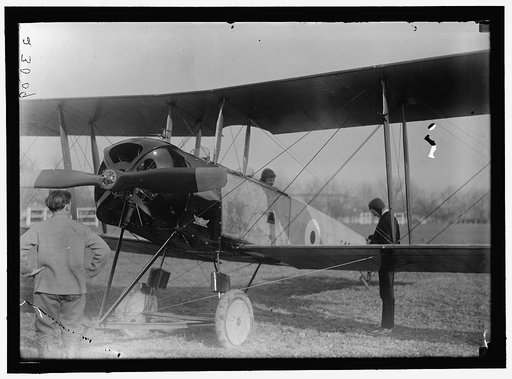 ALLIED AIRCRAFT. DEMONSTRATION AT POLO GROUNDS. COL. CHARLES E. LEE, BRITISH AVIATOR, WITH AVRO TRAINING PLANE DESIGNED BY A.V. ROE OF ENGLAND