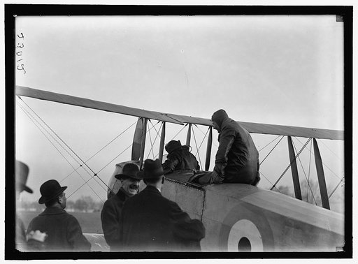 ALLIED AIRCRAFT. DEMONSTRATION AT POLO GROUNDS. COL. CHARLES E. LEE, BRITISH AVIATOR, WITH AVRO TRAINING PLANE DESIGNED BY A.V. ROE OF ENGLAND