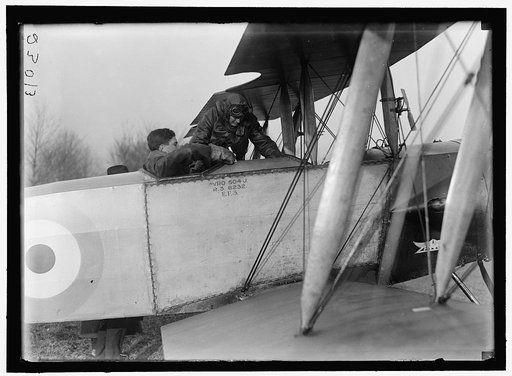 ALLIED AIRCRAFT. DEMONSTRATION AT POLO GROUNDS. COL. CHARLES E. LEE, BRITISH AVIATOR, WITH AVRO TRAINING PLANE DESIGNED BY A.V. ROE OF ENGLAND