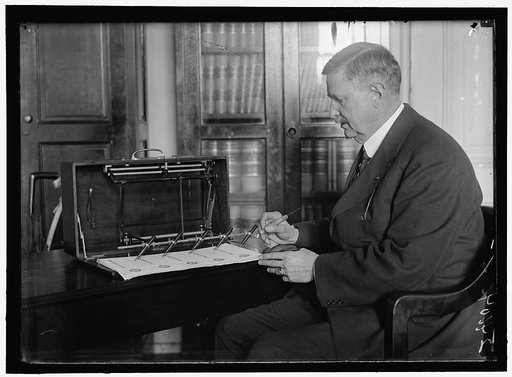 CHECK SIGNING MACHINE IN TREASURY DEPARTMENT; OPERATED BY J.L. SUMMERS