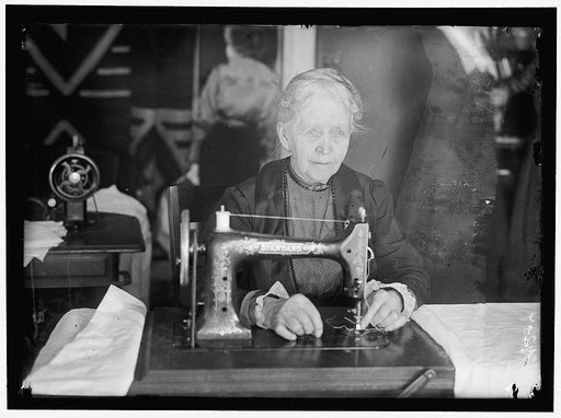 LEGION OF LOYAL WOMEN. MRS. A.J. HUGHES, SEWING ON BEDDING FOR HOSPITALS