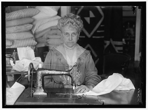 LEGION OF LOYAL WOMEN. MRS. MARY LOGAN TUCKER, SEWING ON BEDDING FOR HOSPITALS