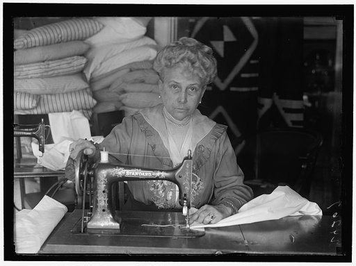 LEGION OF LOYAL WOMEN. MRS. MARY LOGAN TUCKER, SEWING ON BEDDING FOR HOSPITALS