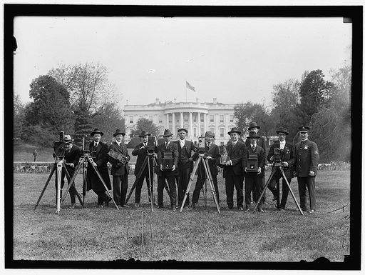 PRESS CORRESPONDENTS. PHOTOGRAPHER ON WHITE HOUSE LAWN