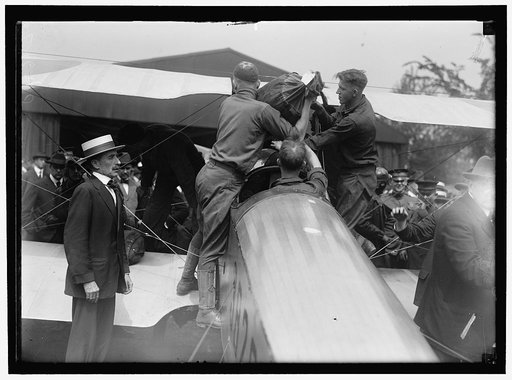 AIR MAIL. INAUGURATION OF SERVICE, POLO FIELD. LOADING
