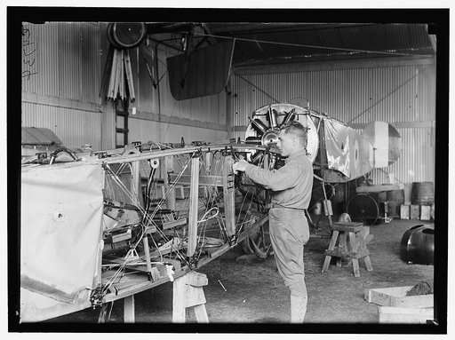 ALLIED AIRCRAFT DEMONSTRATION AT POLO GROUNDS. HANGARS; PLANES, AVRO AND CURTIS BEING CONDITIONED
