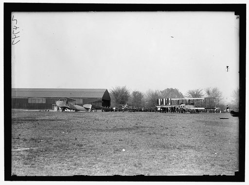 ALLIED AIRCRAFT DEMONSTRATION AT POLO GROUNDS. HANGARS; PLANES, AVRO AND CURTIS BEING CONDITIONED