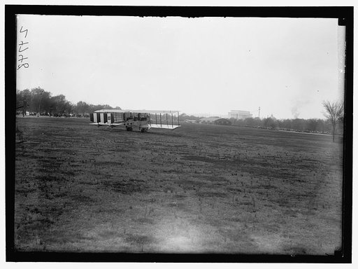 ALLIED AIRCRAFT DEMONSTRATION AT POLO GROUNDS. HANGARS; PLANES, AVRO AND CURTIS BEING CONDITIONED