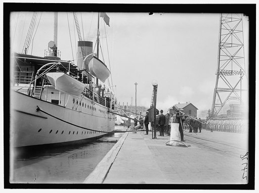 ALDUNATE, SANTIAGO, AMBASSADOR FROM CHILE. AFTER FUNERAL, TAKING BODY TO NAVY YARD AND PLACING ON SHIP. PALLBEARERS AT FUNERAL IN GROUP ARE SEC. LANSING, REPS. HOOD AND GOODWIN, AND SEN. POMERENE