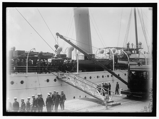 ALDUNATE, SANTIAGO, AMBASSADOR FROM CHILE. AFTER FUNERAL, TAKING BODY TO NAVY YARD AND PLACING ON SHIP. PALLBEARERS AT FUNERAL IN GROUP ARE SEC. LANSING, REPS. HOOD AND GOODWIN, AND SEN. POMERENE