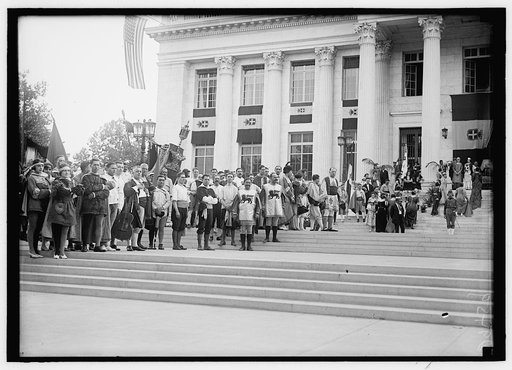 FOURTH OF JULY. FOREIGN GROUPS ON RED CROSS STEPS