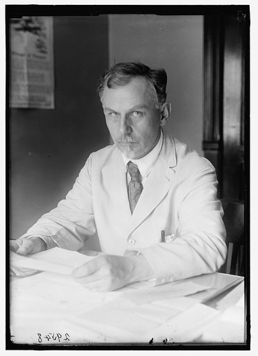 COLEMAN, GEORGE W. DIRECTOR INF. DIV. INF. AND ED. BRANCH, DEPARTMENT OF LABOR. AT DESK