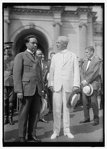 LANSING, ROBERT. SECRETARY OF STATE, 1915-1920. GREETING DR. BRUM, MINISTER FROM URUGUAY