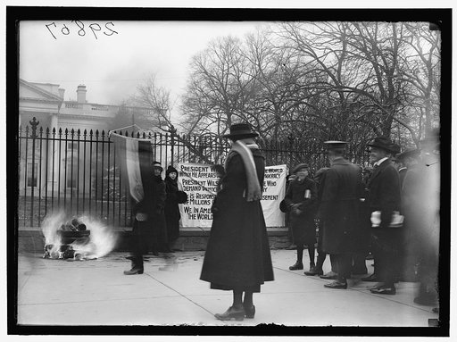 WOMAN SUFFRAGE. BONFIRE ON SIDEWALK BEFORE WHITE HOUSE