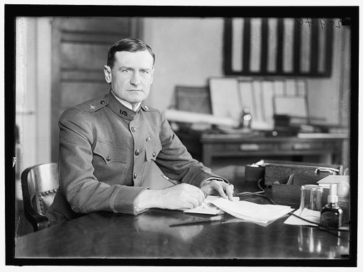 WOOD, ROBERT E. BRIG. GENERAL, U.S.A., ACTING Q.M. GENERAL. AT DESK IN MUNITIONS BUILDING