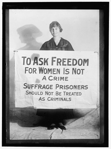 WOMAN SUFFRAGE. LUCY BRANHAM WITH POSTERS