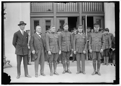 DANIELS, JOSEPHUS. SECRETARY OF THE NAVY, 1913-1921. DECORATING MARINE HEROES