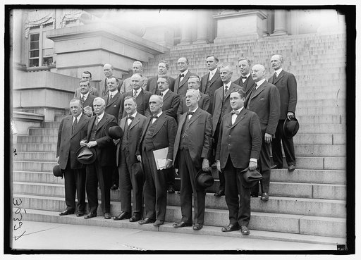 HOUSE OF REPRESENTATIVES. COMMITTEES. NAVAL AFFAIRS. ON NAVY DEPT. STEPS. FRONT: RIORDAN, DANIEL JOSEPH, OF NY; BUTLER, THOMAS STALKER OF PA; SEC. JOSEPHUS DANIELS; PADGETT, LEMUEL PHILLIPS, OF TN, CHAIRMAN; BROWNING, WILLIAM JOHN, OF NJ; McARTHUR, CLIFTON NESMITH, OF OR. 2ND ROW: OLIVER, WILLIAM BA
