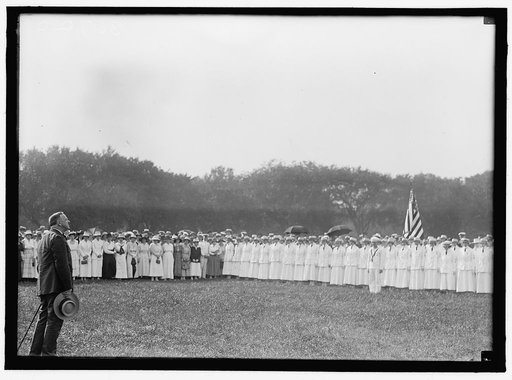 DANIELS, JOSEPHUS. SECRETARY OF THE NAVY, 1913-1921. REVIEWING YEOMAN (F) BEFORE THEIR DISMISSAL